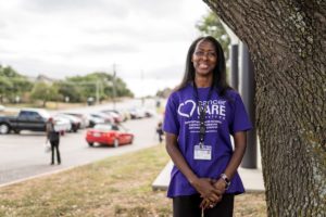 Carlene King, a community health worker at Cancer Care Services, stands outside LVTRise food pantry. (Cristian ArguetaSoto | Fort Worth Report)