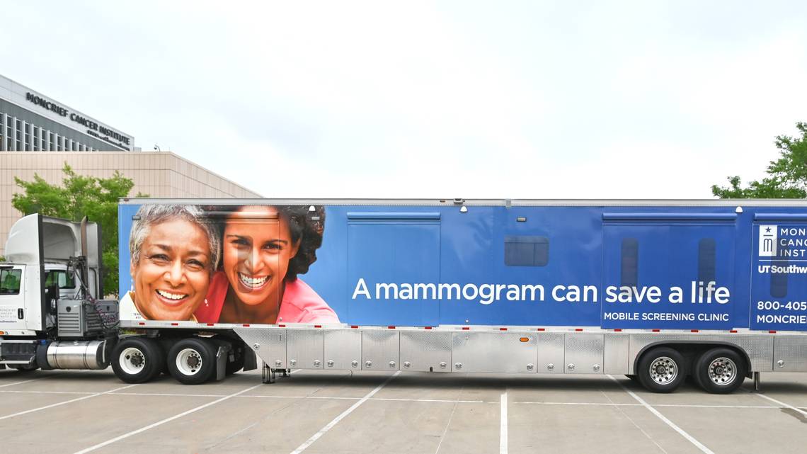 Moncrief Cancer Institute mobile health unit at a 2024 health expo.